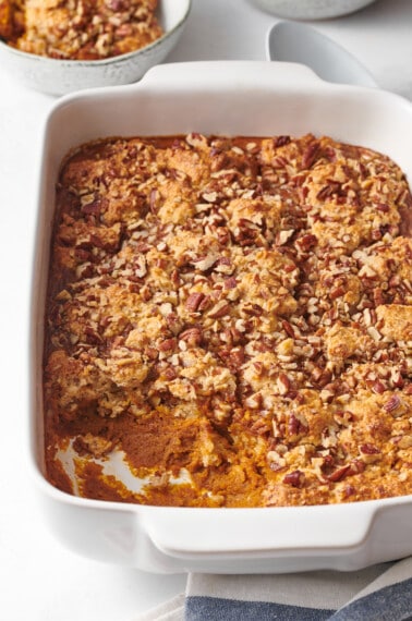 A baking pan full of pumpkin cobbler.