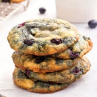 A stack of white chocolate blueberry cookies.