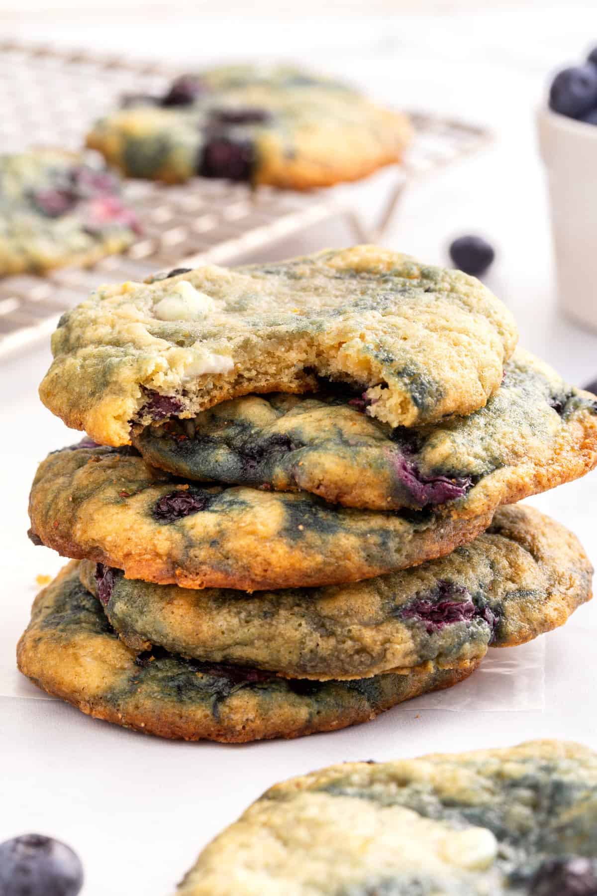 stack of five blueberry cookies.