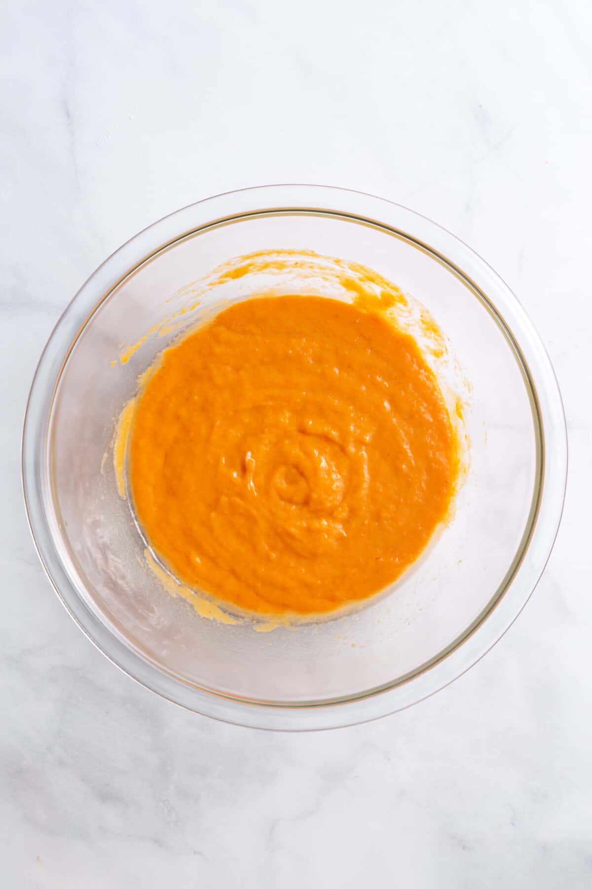 pumpkin puree mixture in a large glass bowl.
