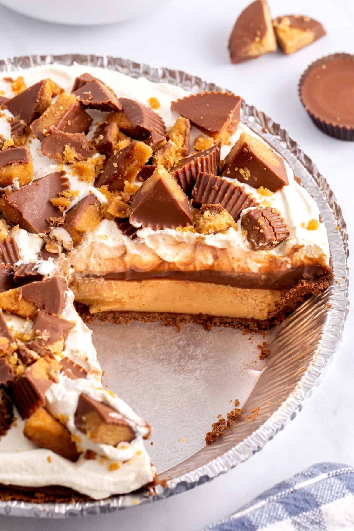 Reese's peanut butter cup pie with a piece missing.