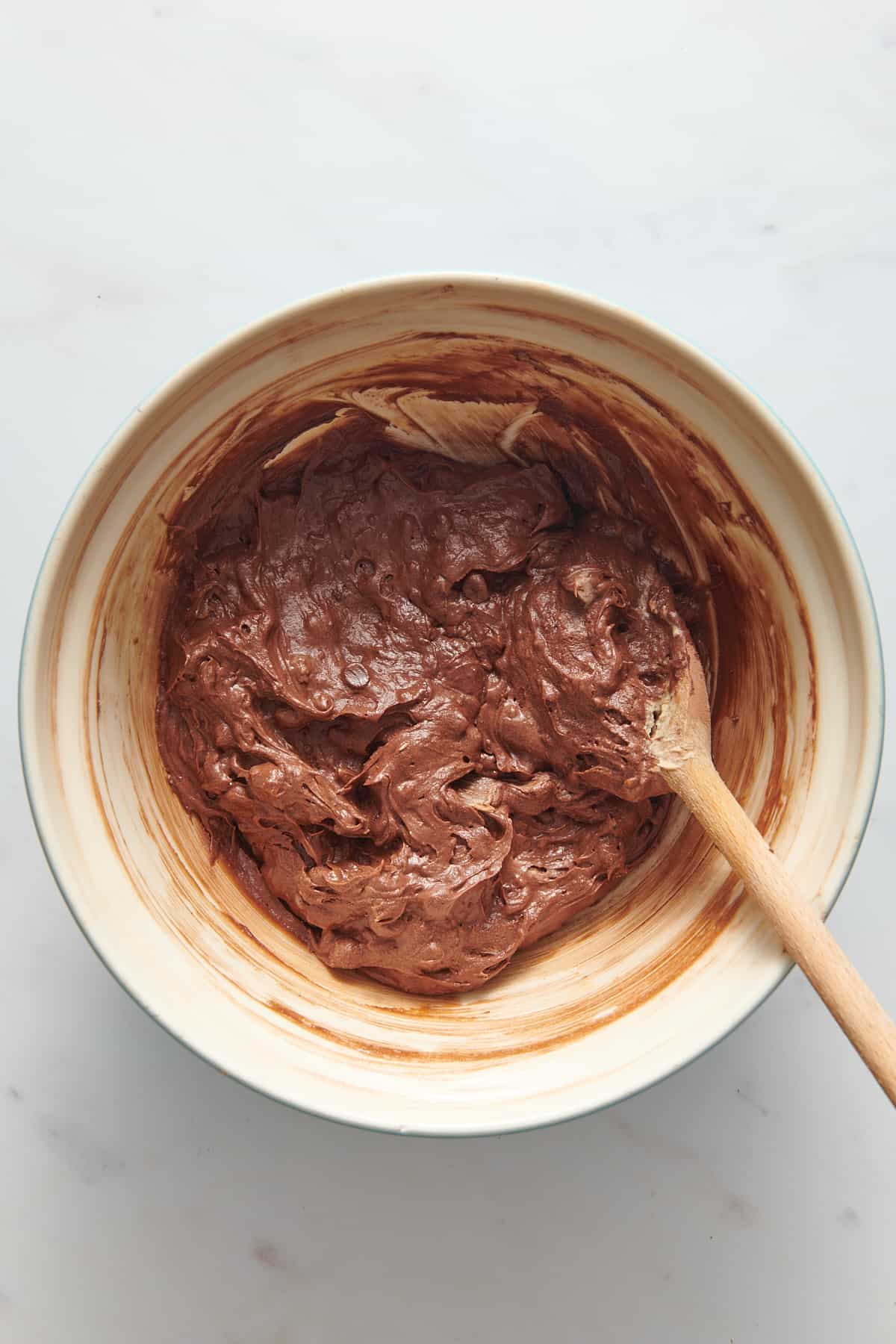 brownie batter in a large mixing bowl. 