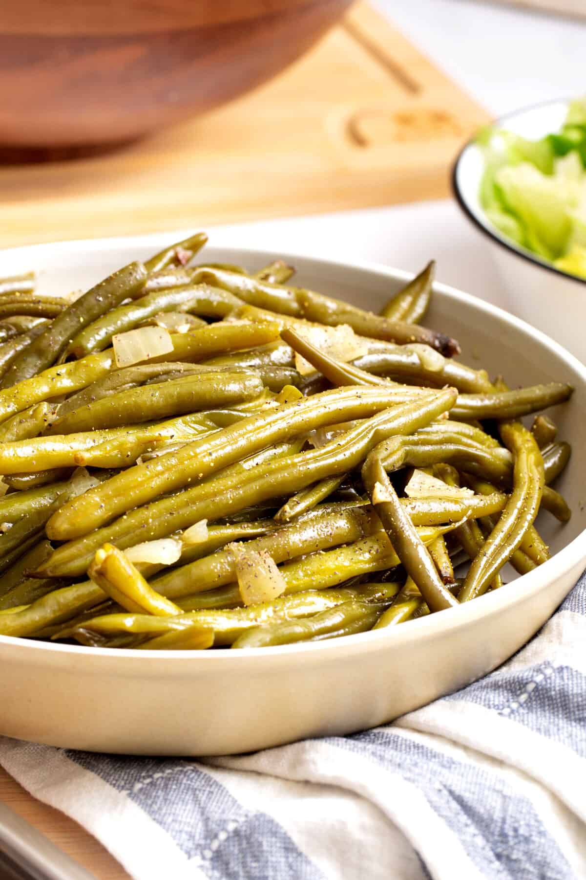 shallow plate of slow cooker green beans.