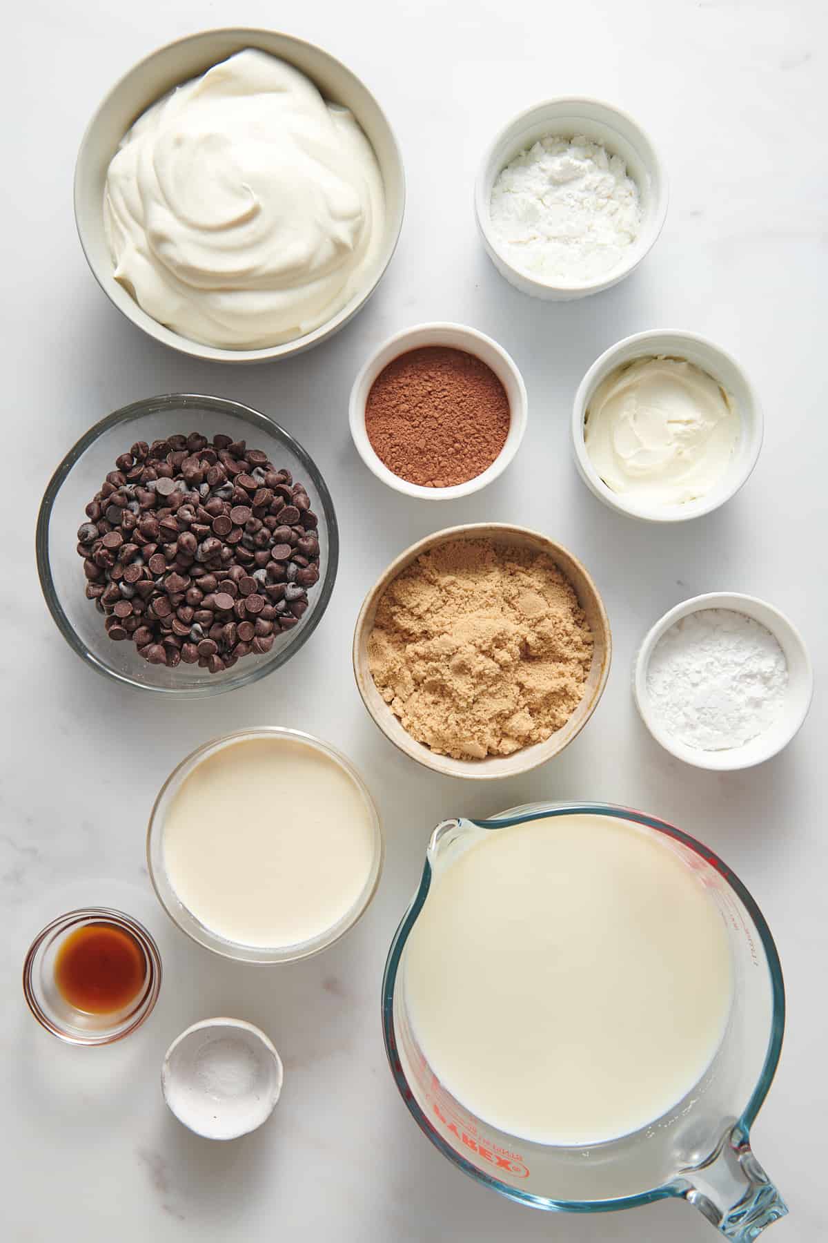 ingredients to make chocolate pudding pie with graham cracker crust. 