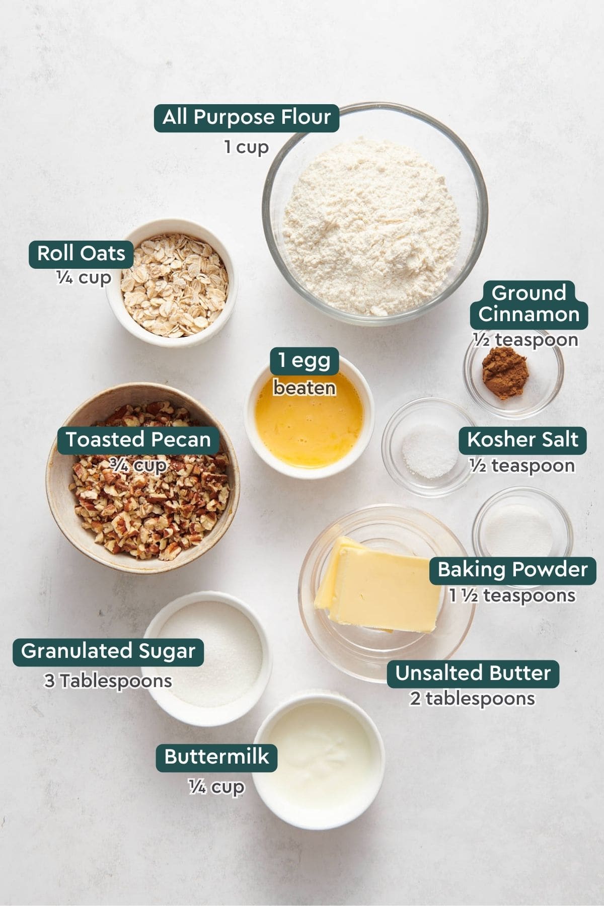 Ingredients for pumpkin cobbler topping: flour, oats, egg, cinnamon, salt, pecans, baking powder, butter, buttermilk, sugar.