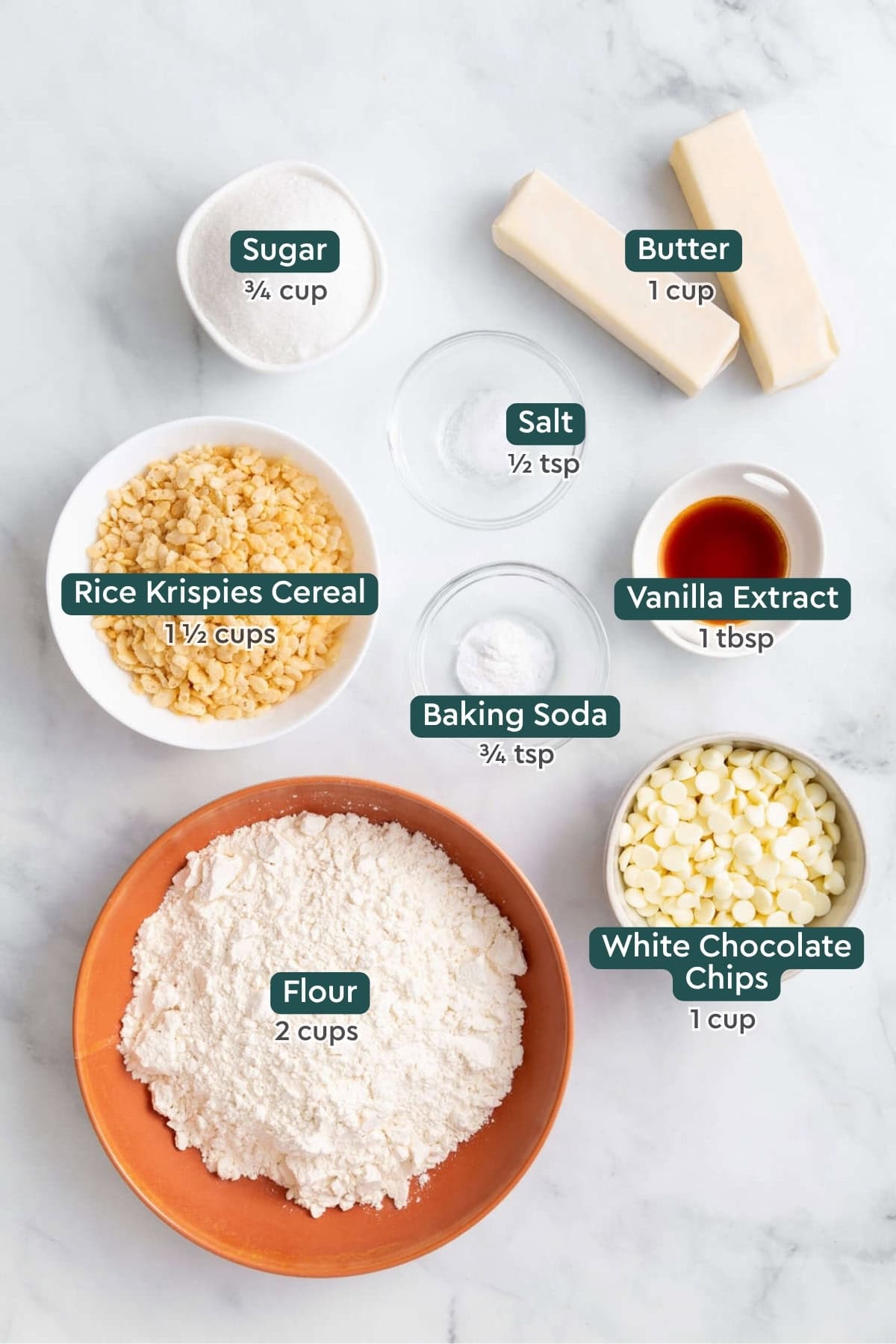 Ingredients needed to make rice krispie treat cookies on a white countertop.