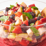 A bowl of Christmas fruit salad.