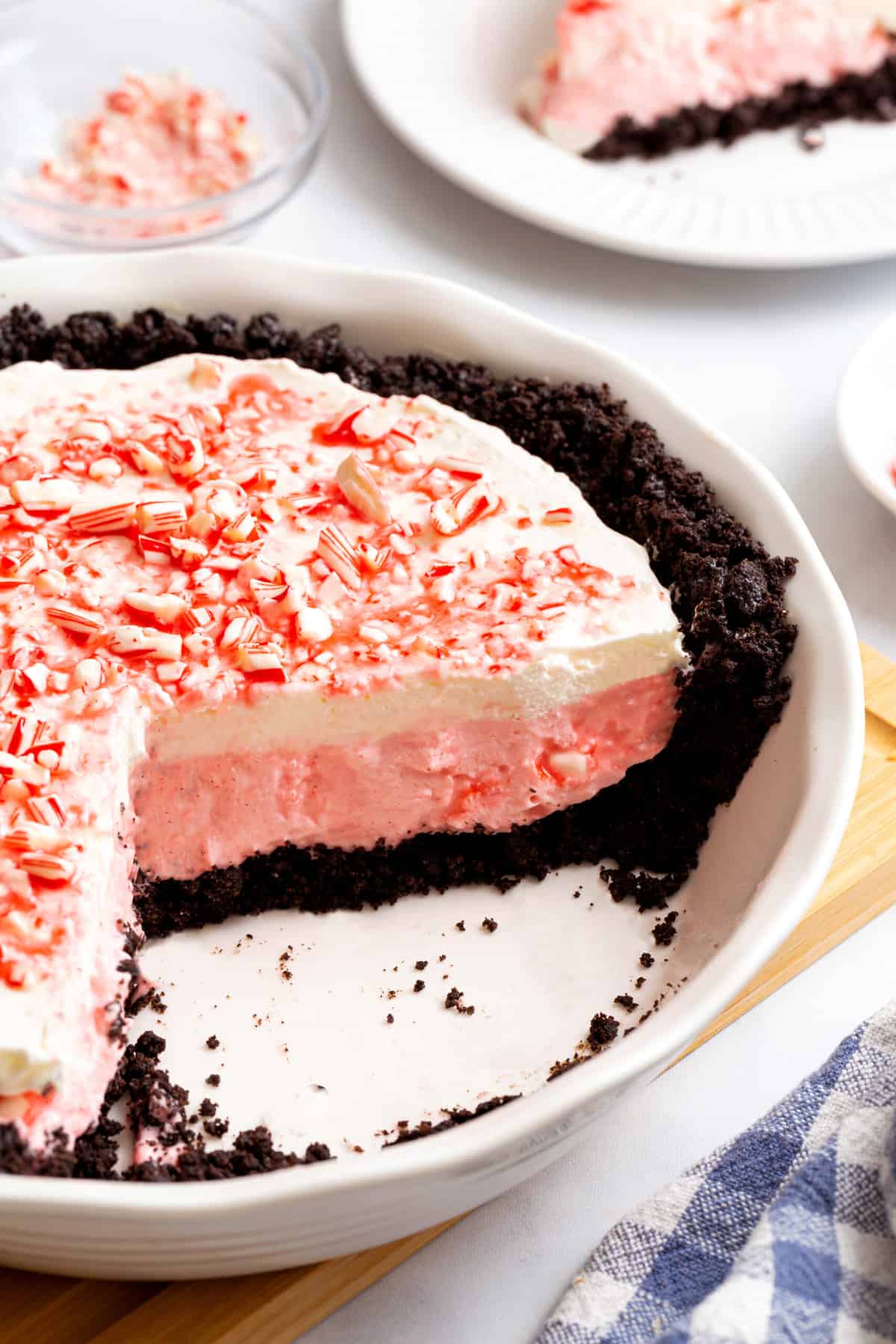 close up image of the cross section of candy cane pie. 