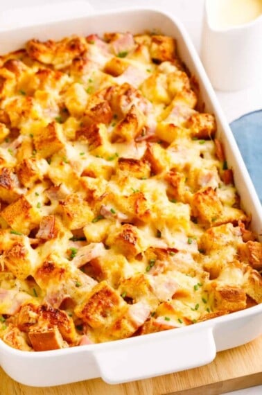 A dish of baked Eggs Benedict casserole.