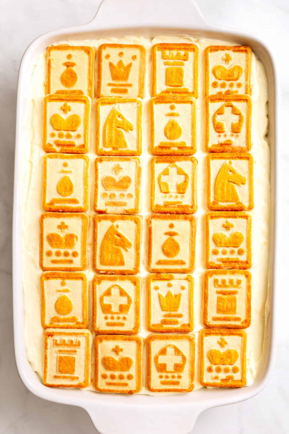 top down image of finished chessman banana pudding in a 9x13 inch casserole dish.