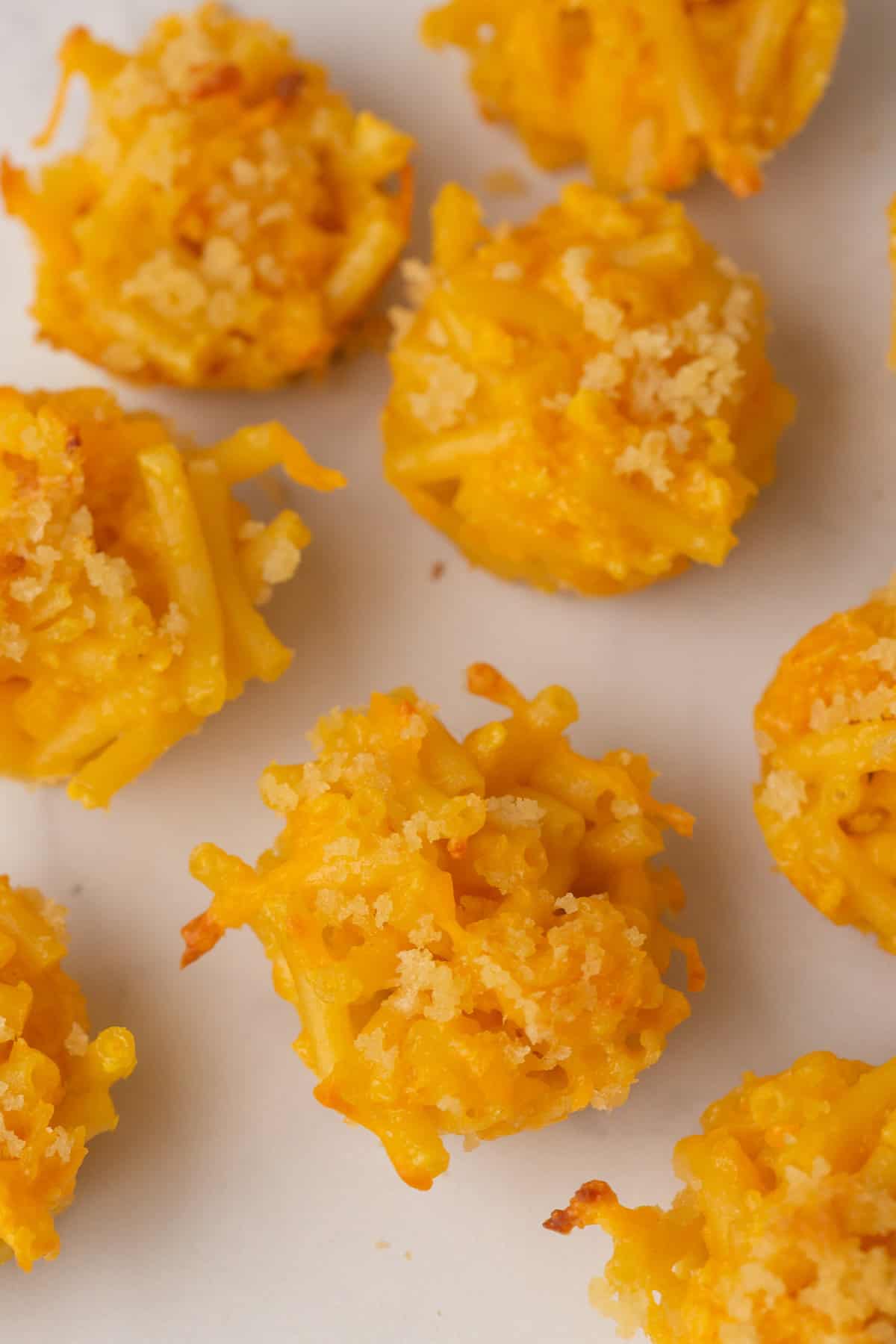 close up image of mac and cheese bites. 