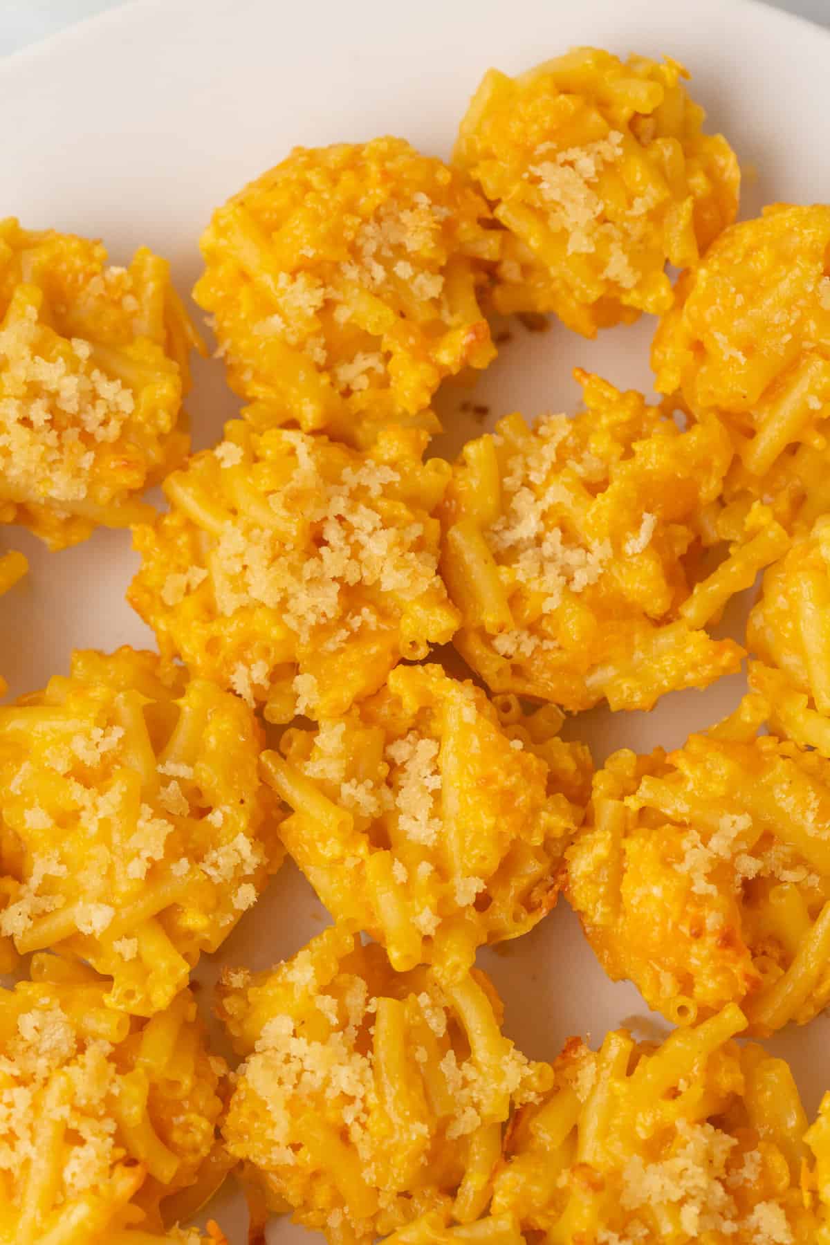 close up image of mac and cheese bites. 