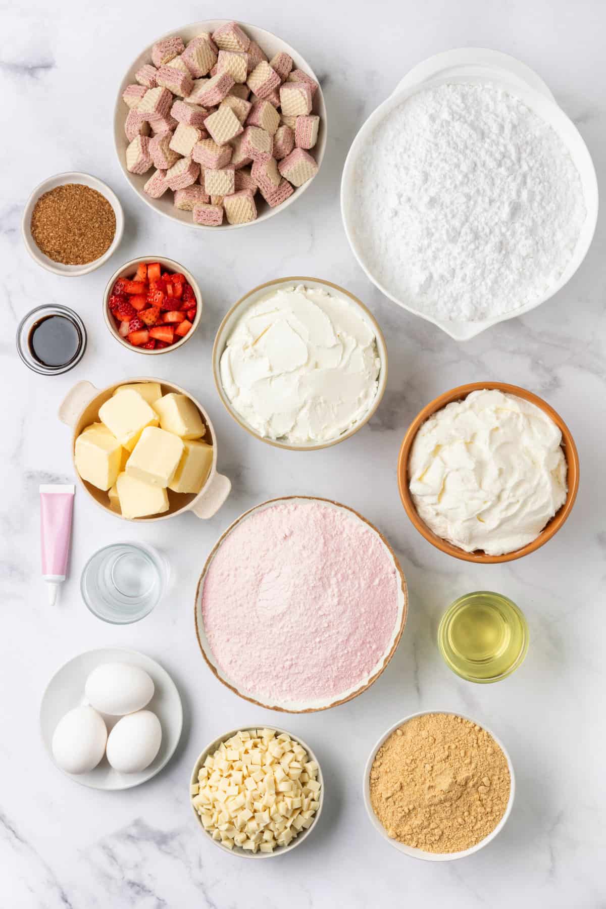 ingredients to make strawberry shortcake cheesecake. 