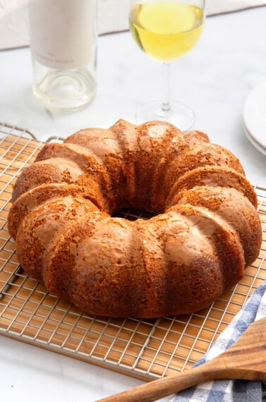 A crack cake on a wire rack.