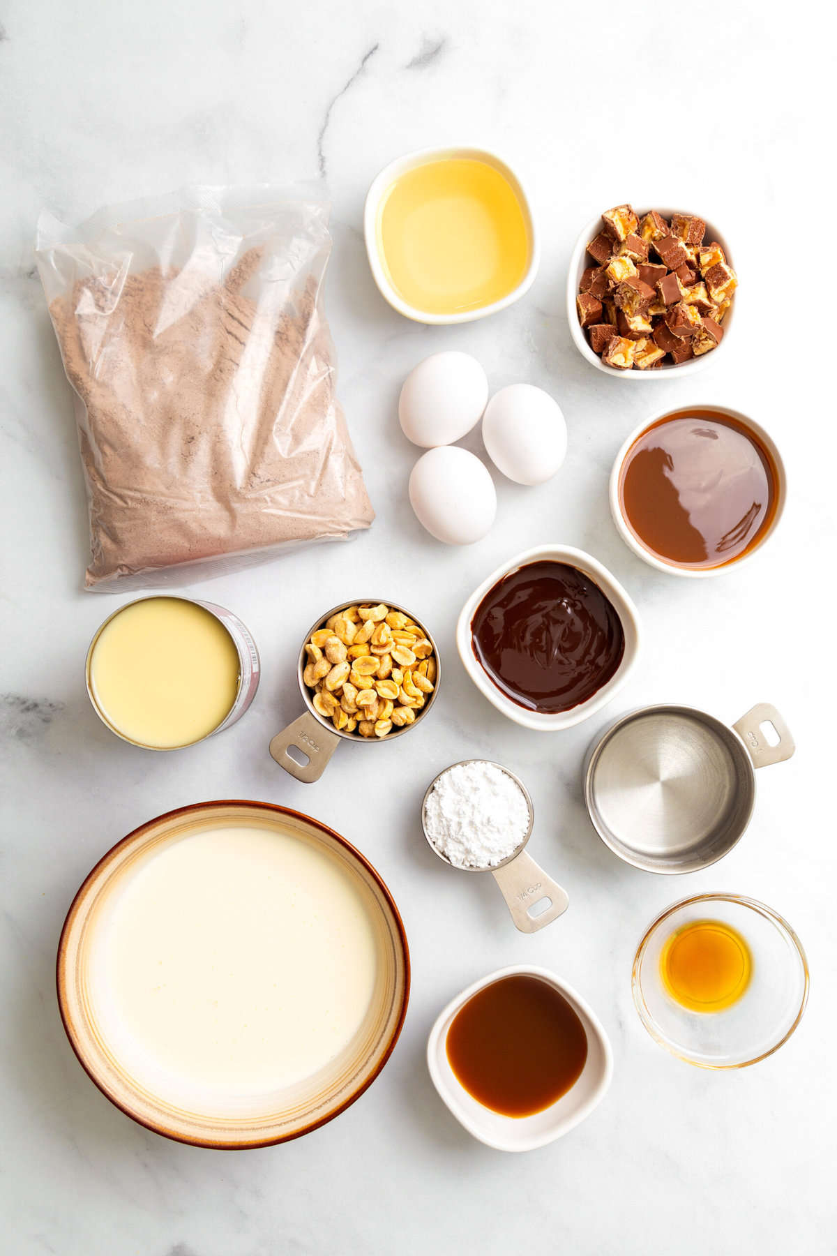 ingredients to make snickers cake. 