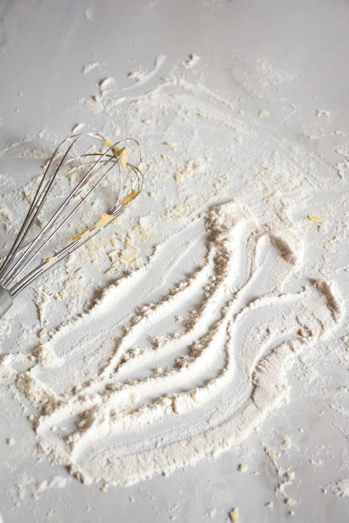 marble countertop with baking powder and flour. 