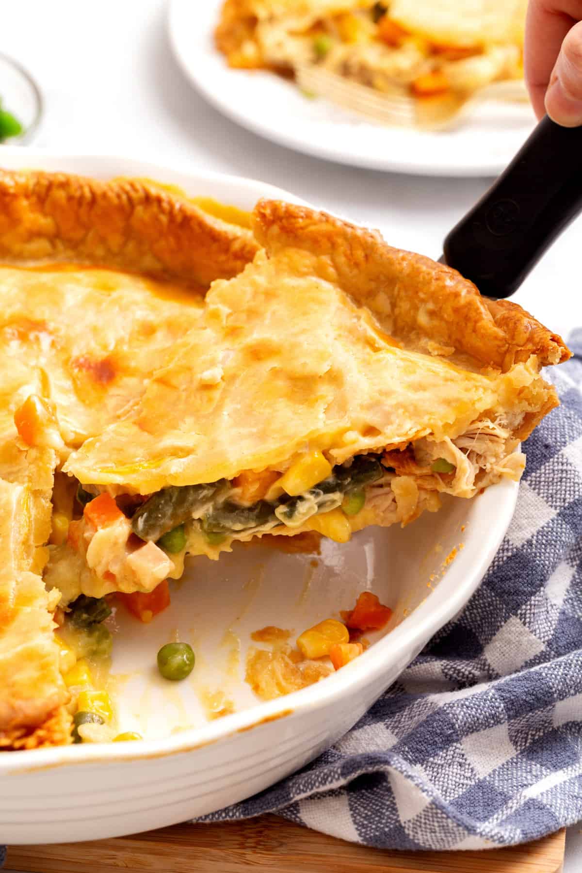 close up image of a slice of campbell's chicken pot pie. 