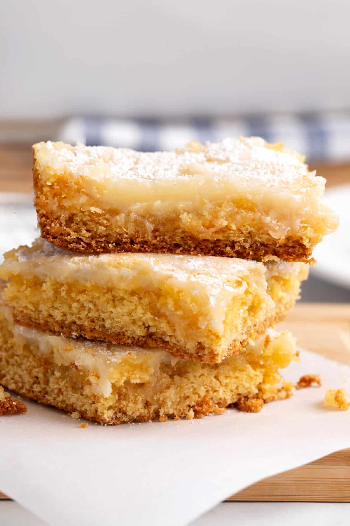 close up image of the cross section of three cream cheese bars stacked. 