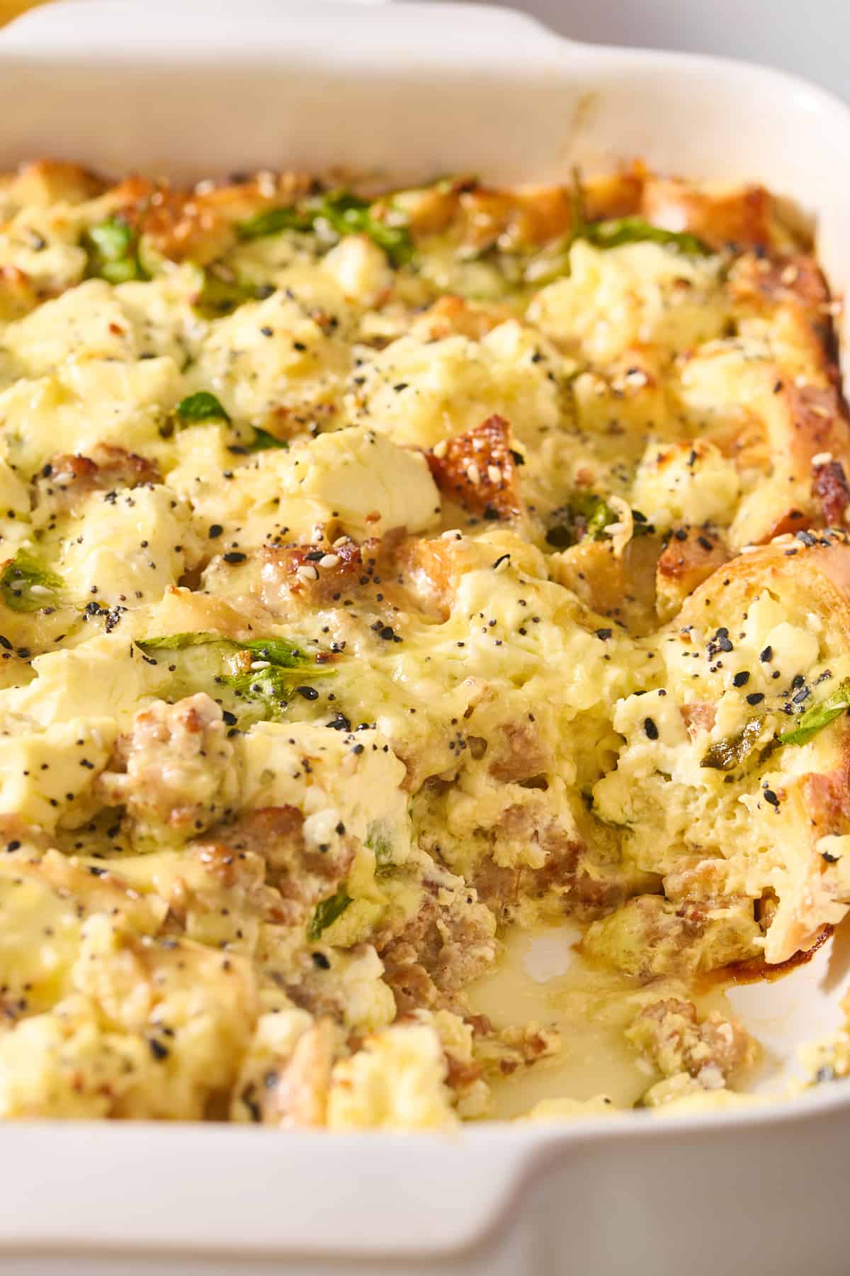close up image of everything bagel breakfast casserole. 
