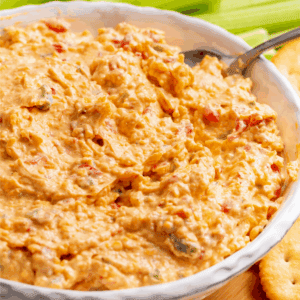 A bowl of creamy pimento cheese dip.
