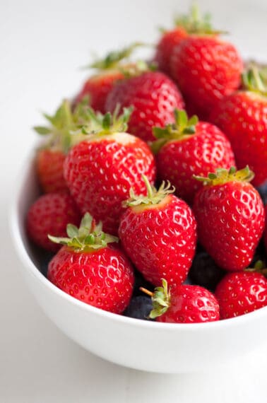 A bowl of fresh strawberries.