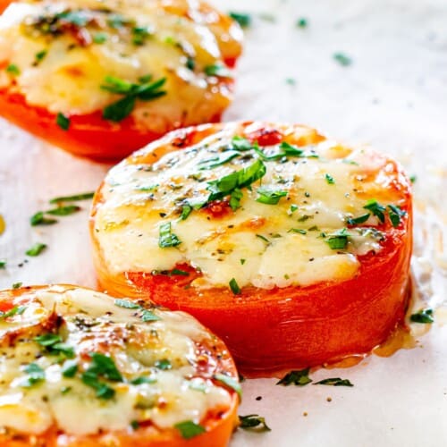 baked parmesan tomatoes with grated cheese on top