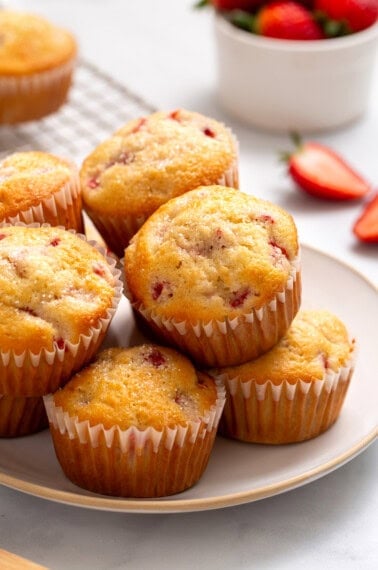 A plate with easy strawberry muffins.