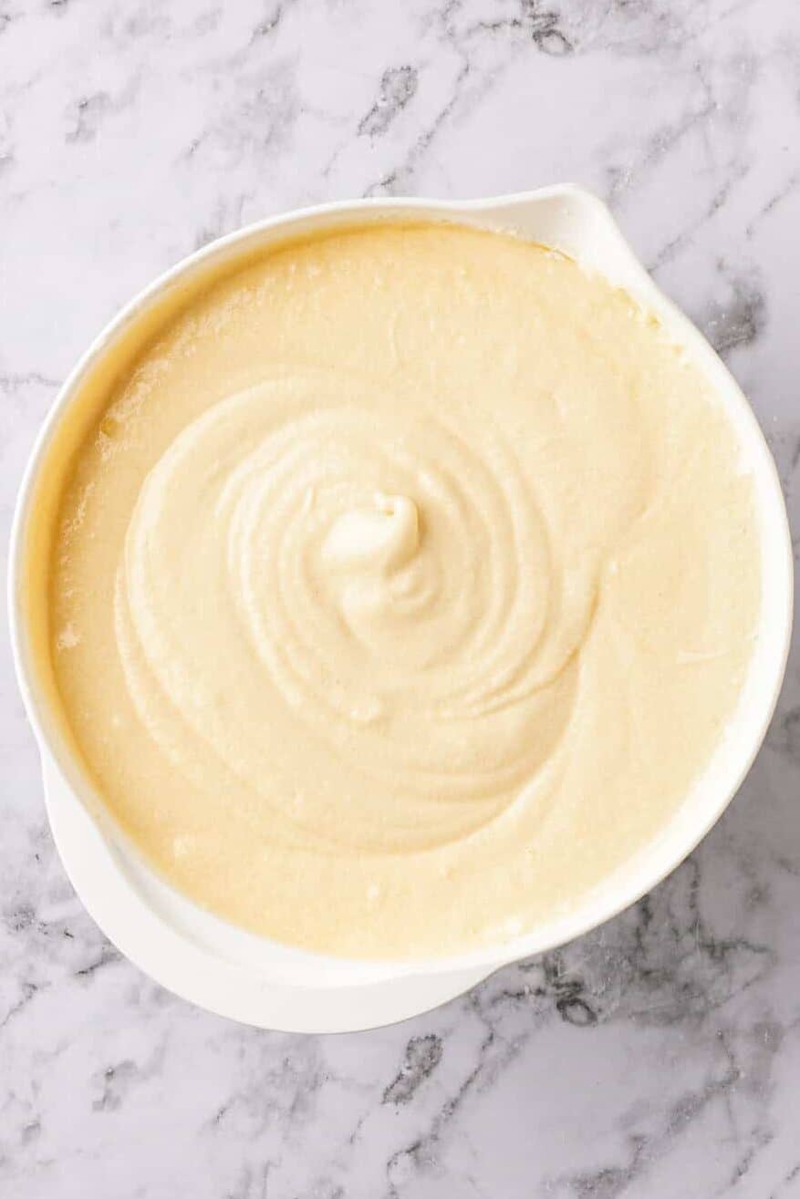 mixing the cake batter until smooth. 
