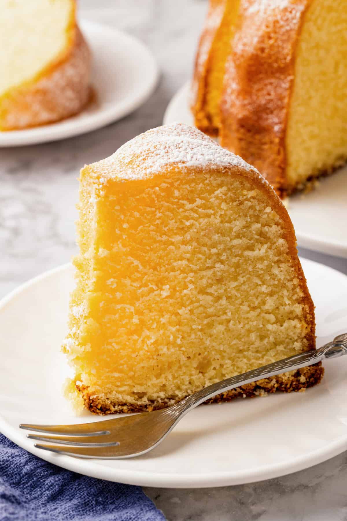 A slice of buttermilk pound cake on a plate.