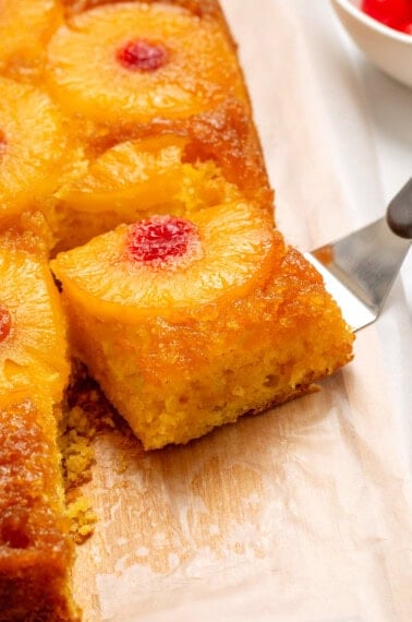 close up picture of one slice of pineapple upside down cake