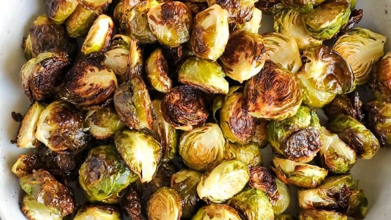 A bowl of roasted brussels sprouts. 