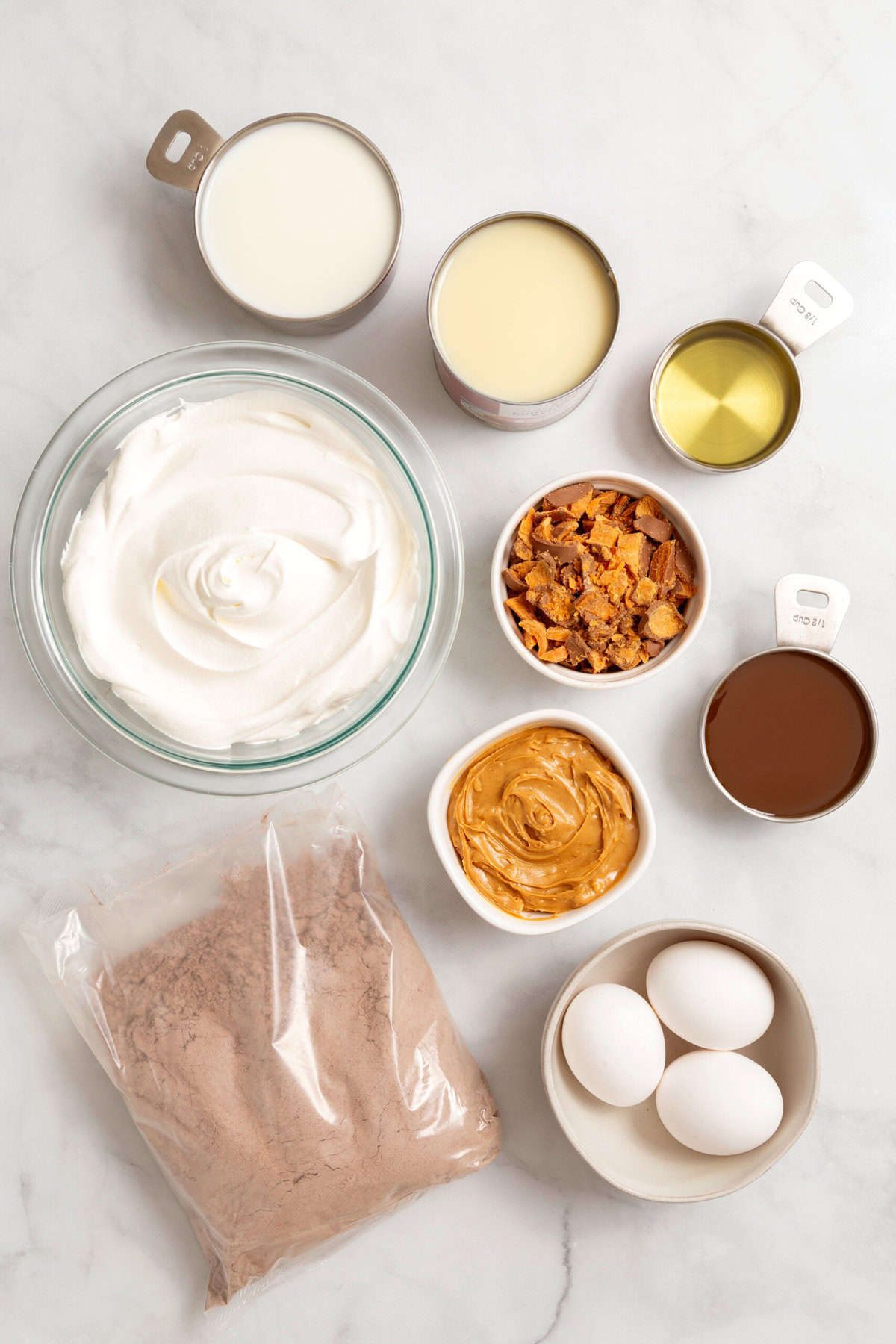 Ingredients to make Butterfinger poke cake.