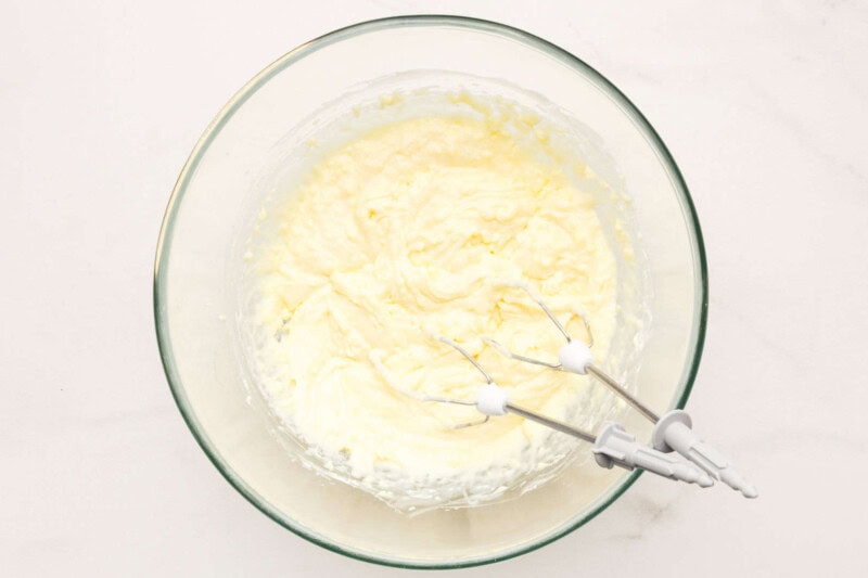 Whipped heavy cream in a bowl.