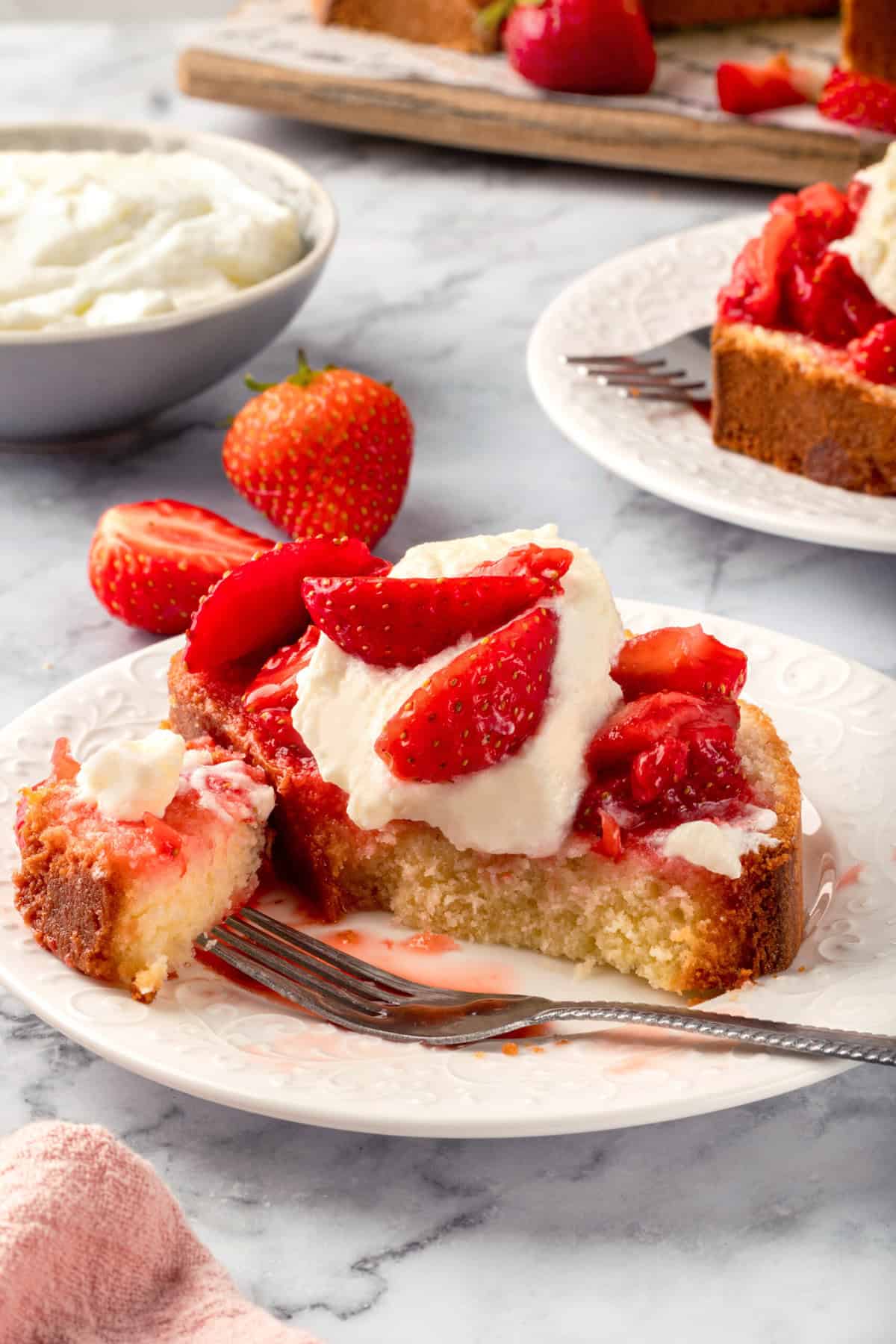 Play with a slice of strawberry shortcake poundcake. 