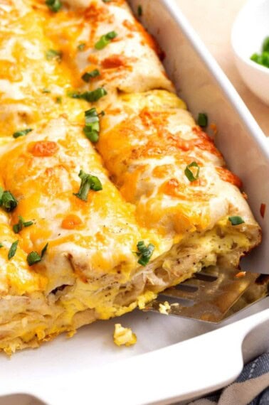 breakfast burrito casserole in a white dish