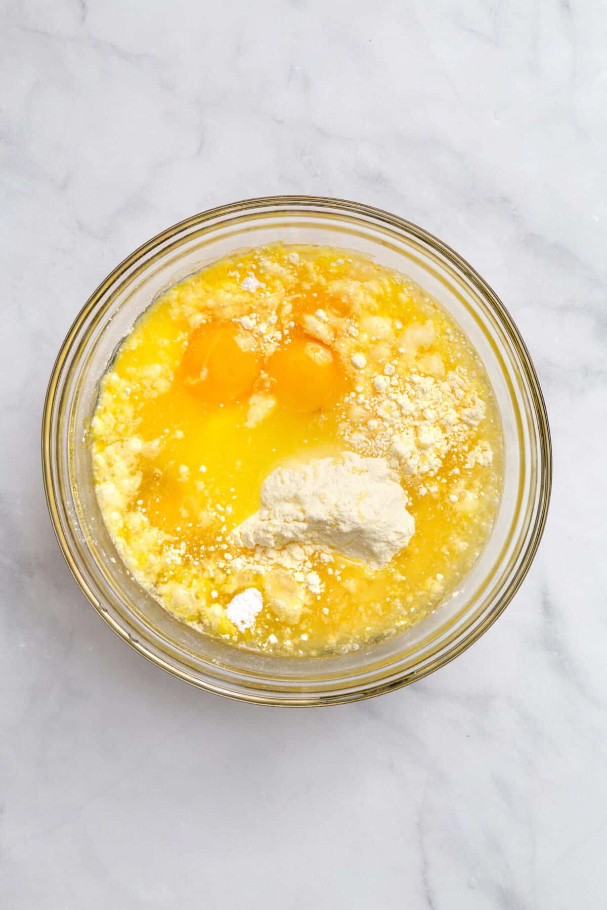 ingredients for lemon sheet cake in mixing bowl