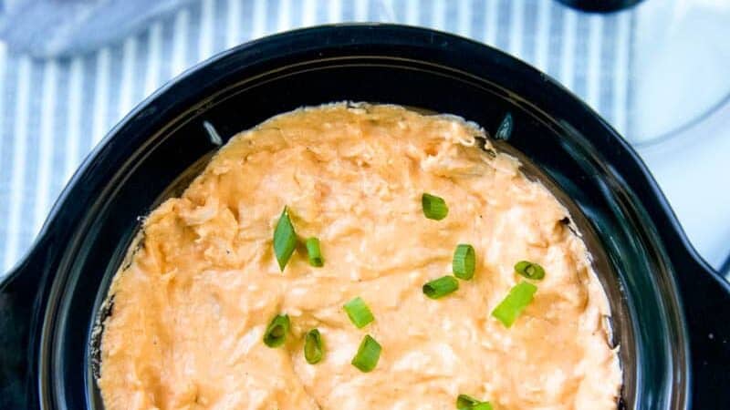 Healthy Buffalo Chicken Dip is a delicious, lighter, no-guilt version of your favorite game-day appetizer! All the flavor of Buffalo Chicken Dip but a skinny version! #buffalochicken #buffalochickendip #dip #appetizer #gamedayappetizer #crockpot #slowcooker
