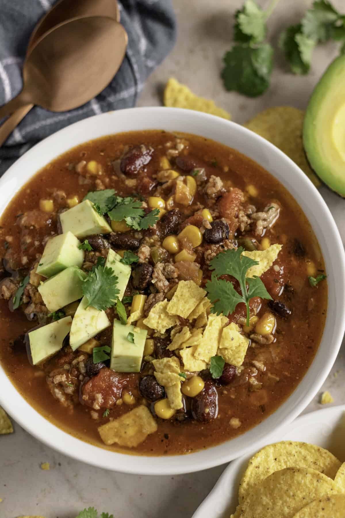 Slow cooker taco soup with avocado.