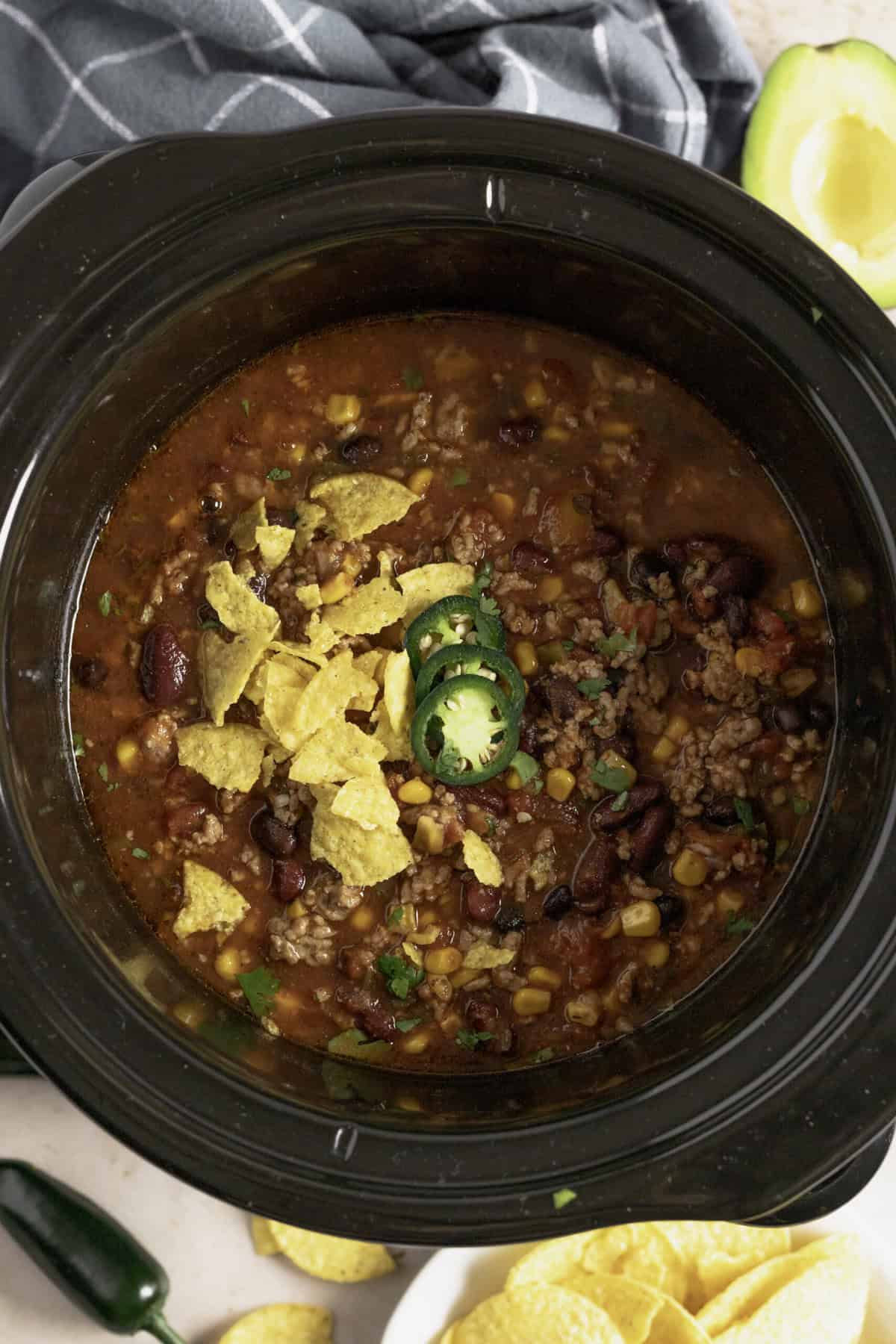 Top down image of slow cooker taco soup in a crockpot.