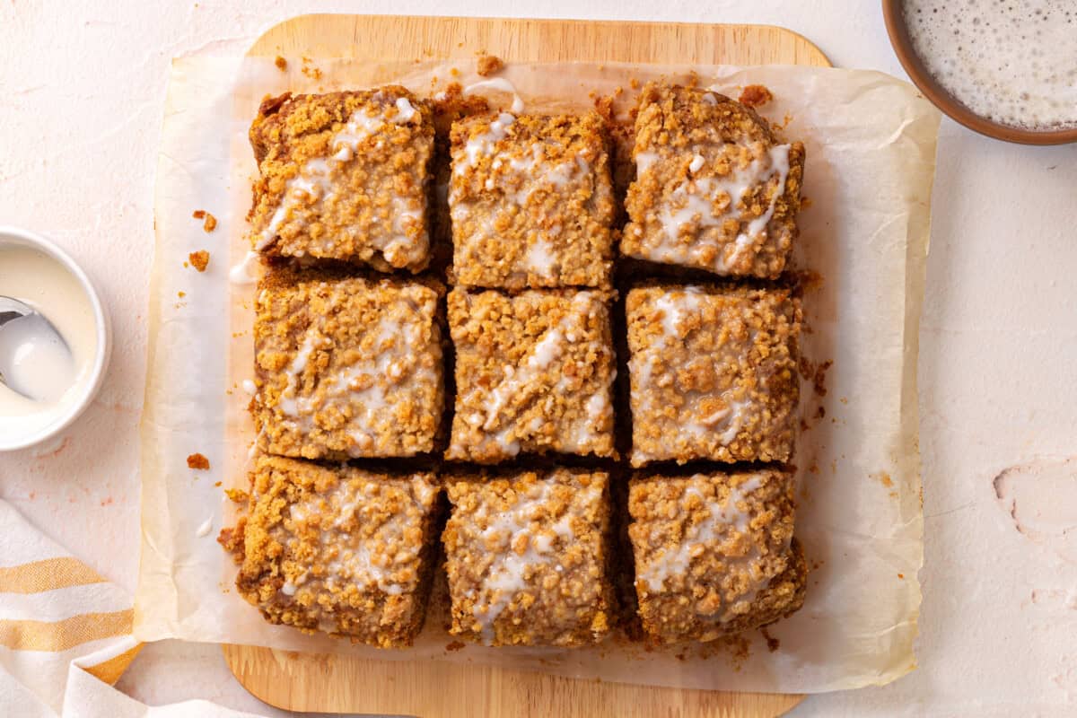 Pumpkin coffee cake cut into squares.
