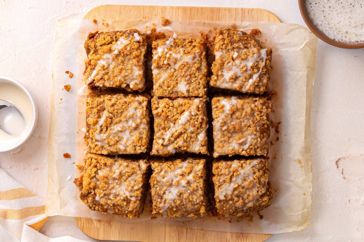Pumpkin coffee cake cut into squares.