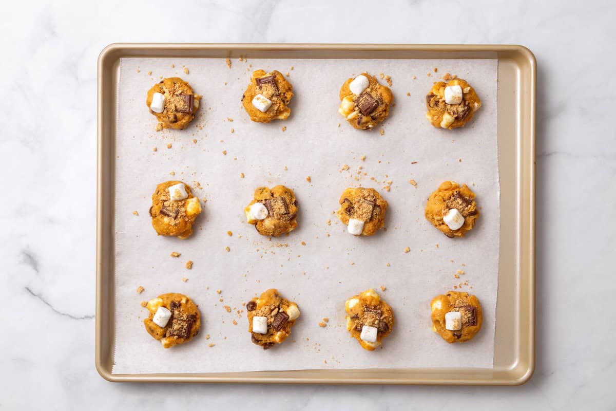 pumpkin s'more cookies baked pumpkin s'more cookies baked on a tray.