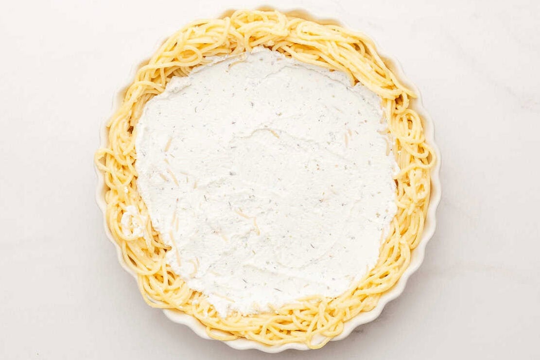 ricotta cheese in a spaghetti crust.