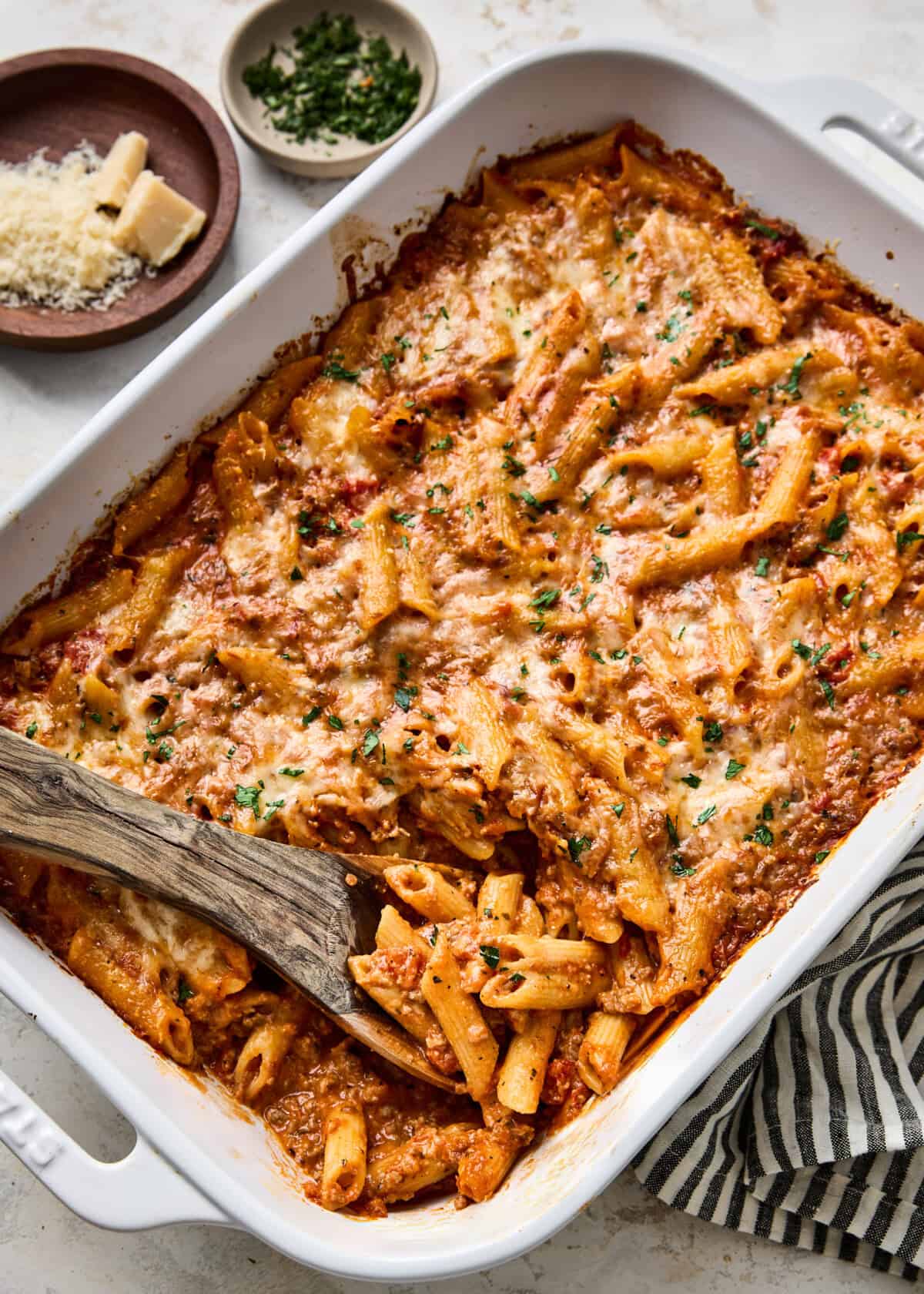 baked penne pasta with marinara sauce and cheese.