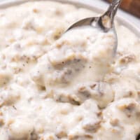 sausage gravy with a spoon.