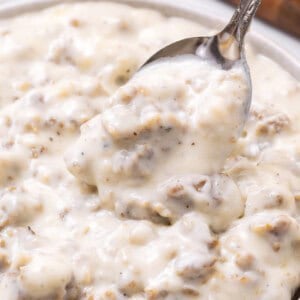 sausage gravy with a spoon.