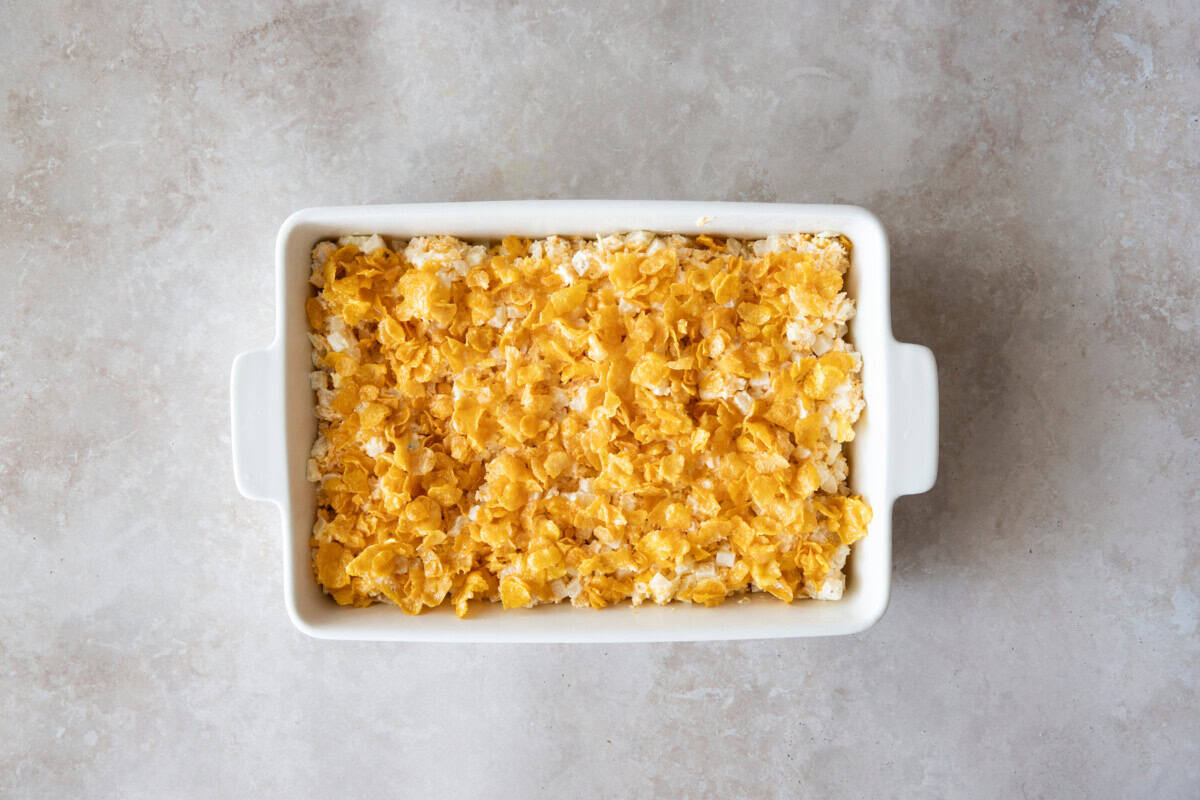 Overhead view of cheesy potato casserole before baking