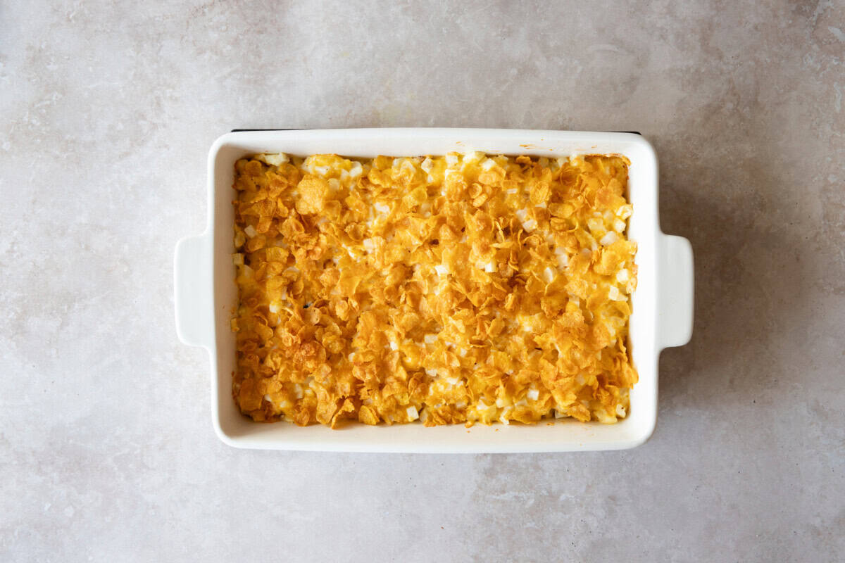 Overhead view of easy cheesy potatoes in baking dish