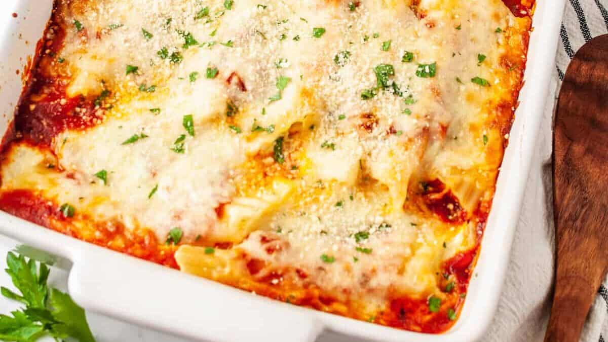 Cheese manicotti in a baking dish.