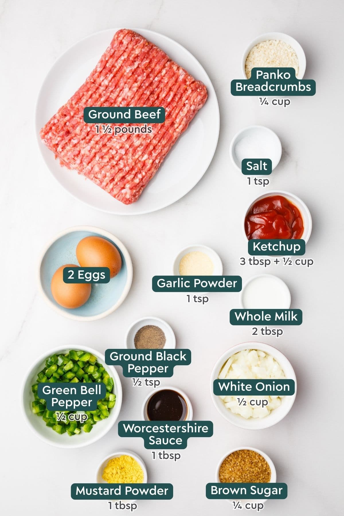 Ingredients for southern style meatloaf, including ground beef, panko, salt, ketchup, eggs, garlic, milk, pepper, onion, bell pepper, worcestershire, mustard, and brown sugar.